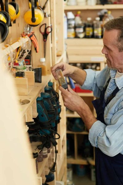 Senior Worker Choosing Tools Senior Worker Choosing Tools